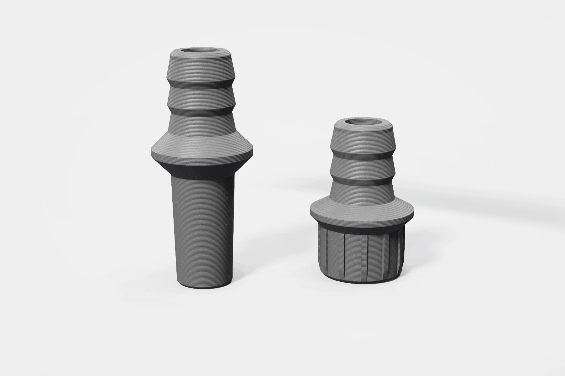 The two connectors shown separately for detail; both arrive fitted to the tubing
